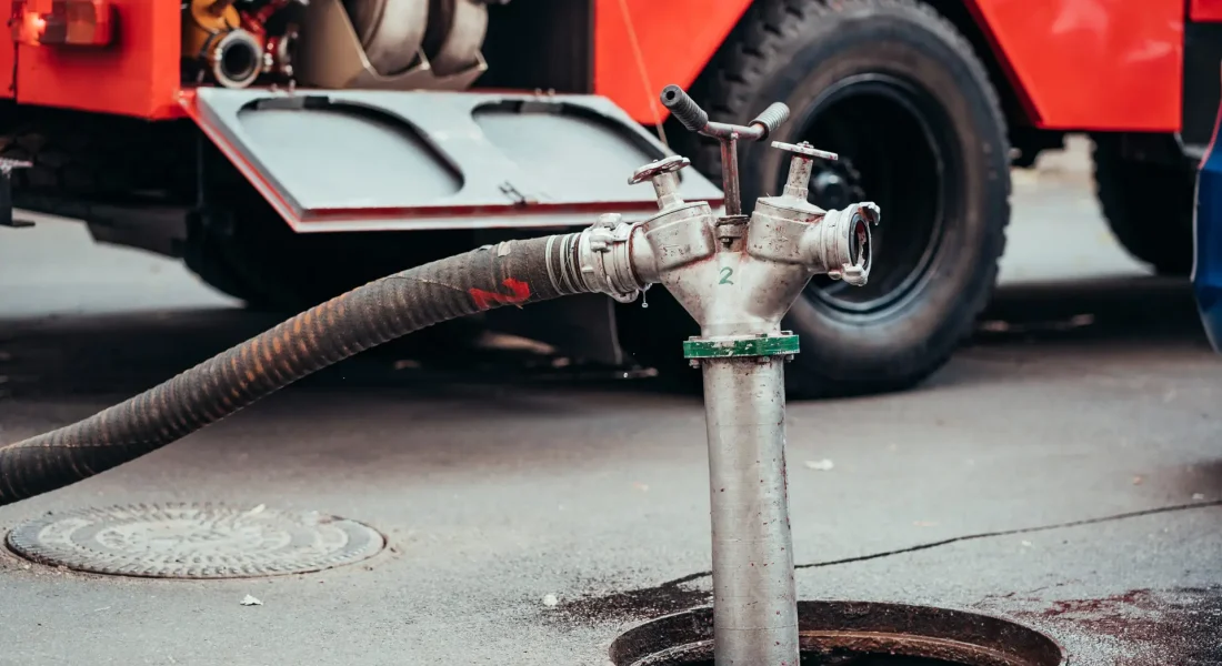 Fire Hydrant In Use During a Structure Fire